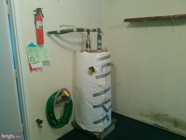 a view of staircase with white walls