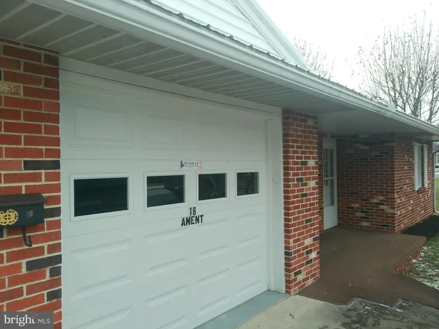 a front view of a house with glass door