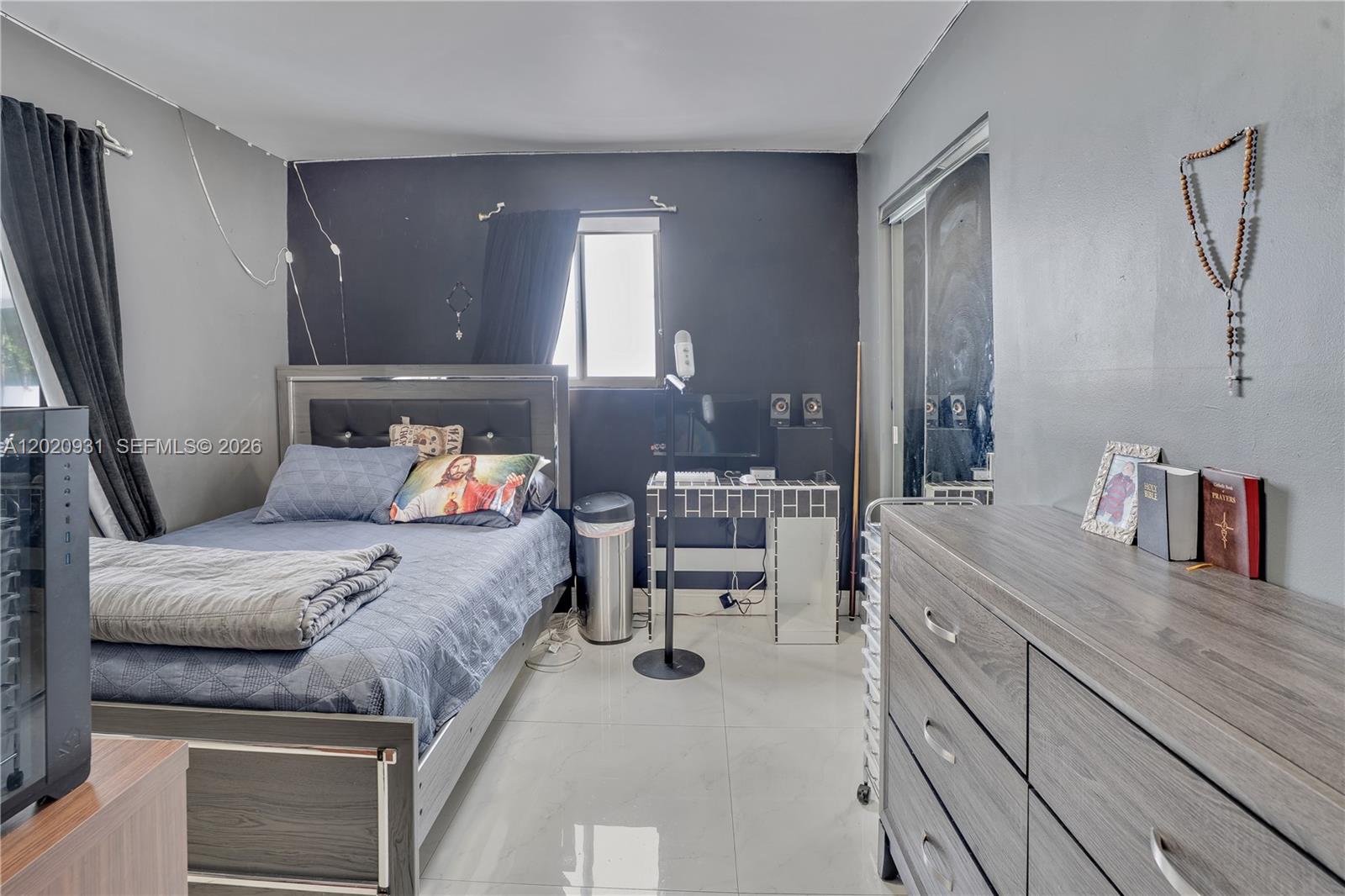 1360 Northwest 77th Street Miami, FL 33147 - Photo 11 of 41 a bedroom with furniture and a wooden floor