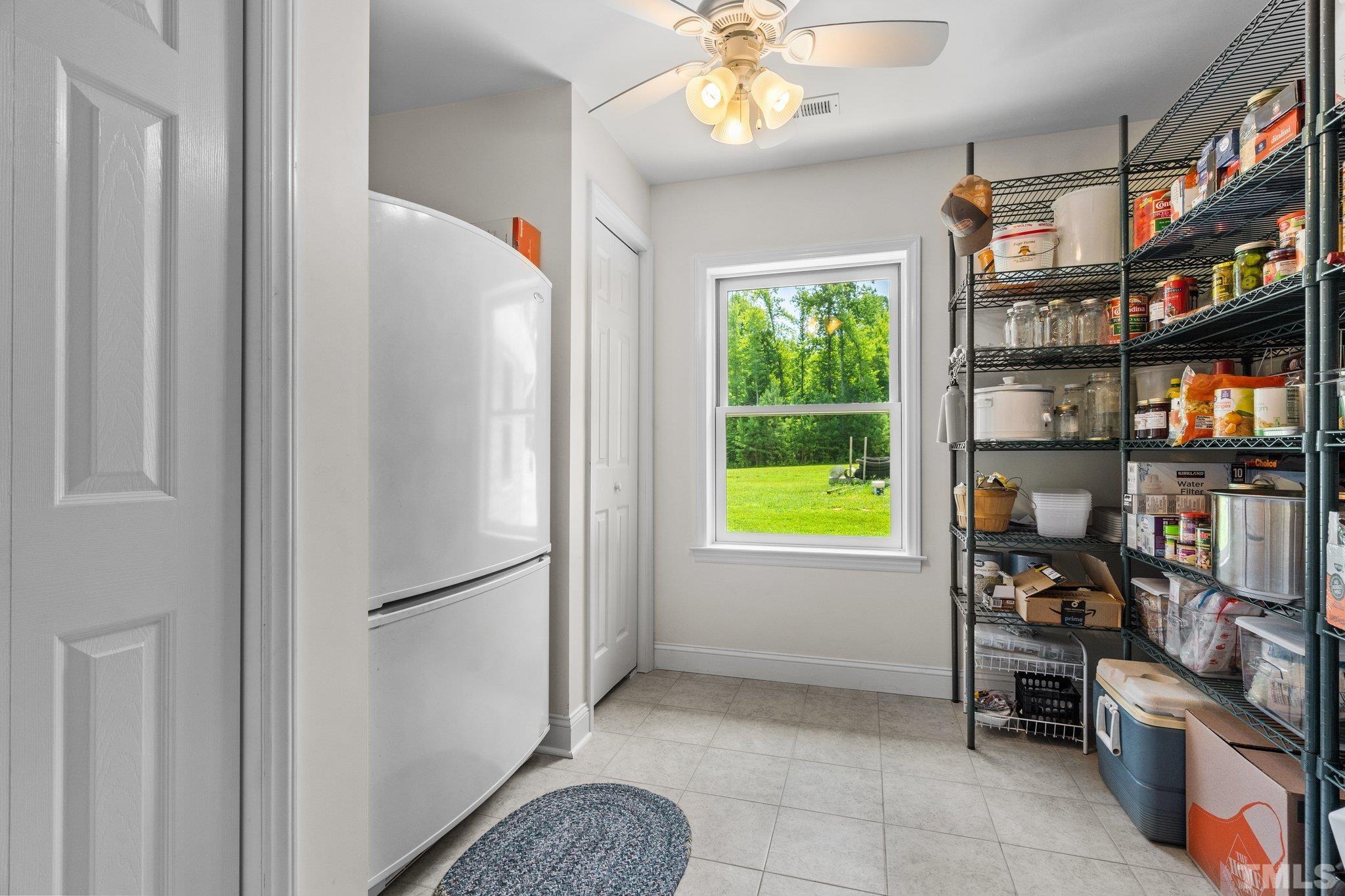 5012 Payton Drive Rougemont, NC 27572 - Photo 11 of 47 a view of room with workspace and a window