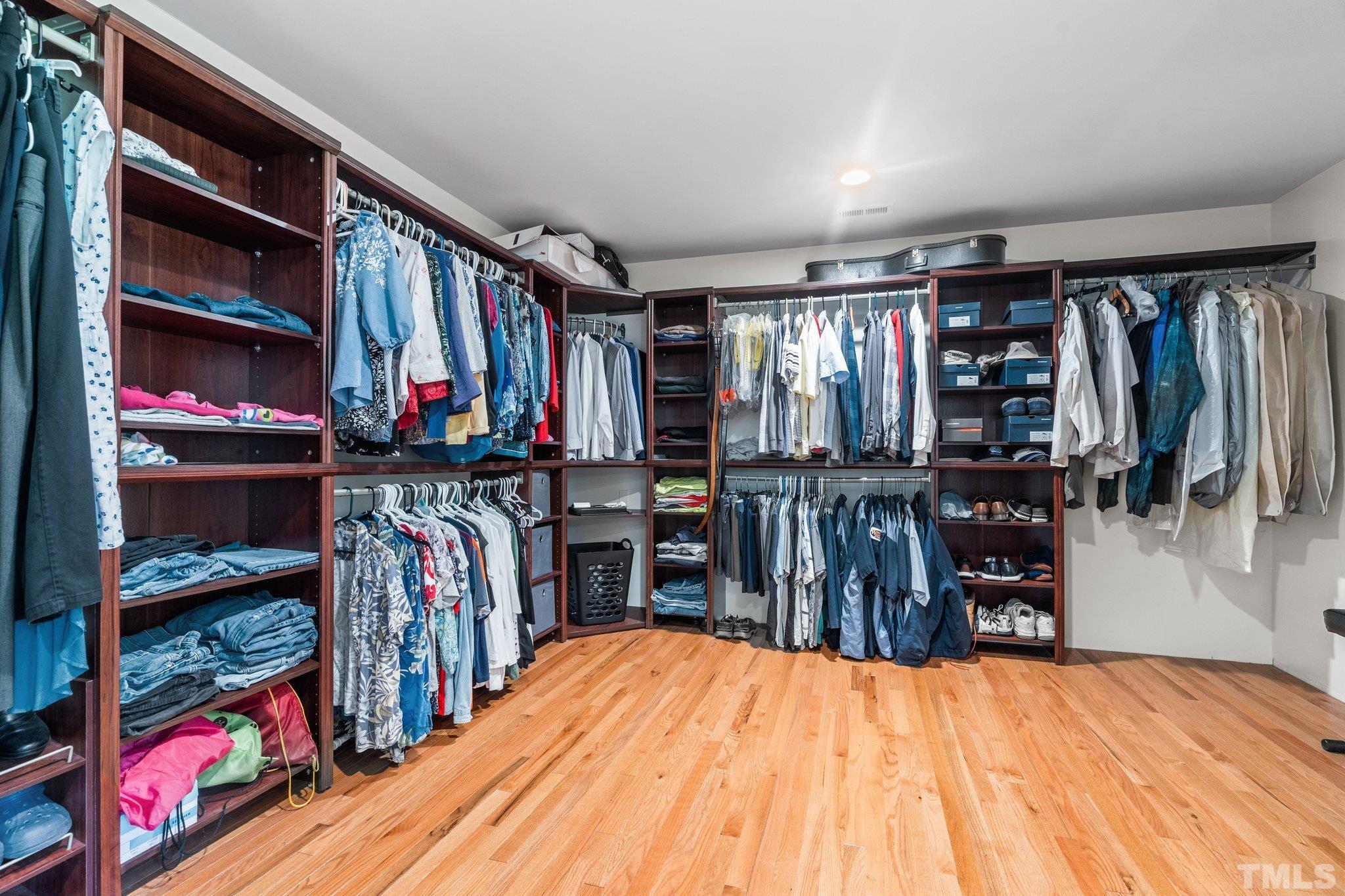 5012 Payton Drive Rougemont, NC 27572 - Photo 18 of 47 a view of walk in closet with clothes and shoes