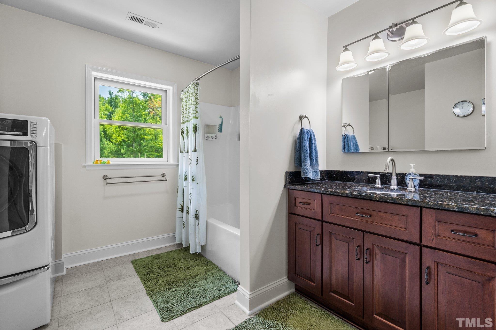 5012 Payton Drive Rougemont, NC 27572 - Photo 25 of 47 a bath room with sink and mirror