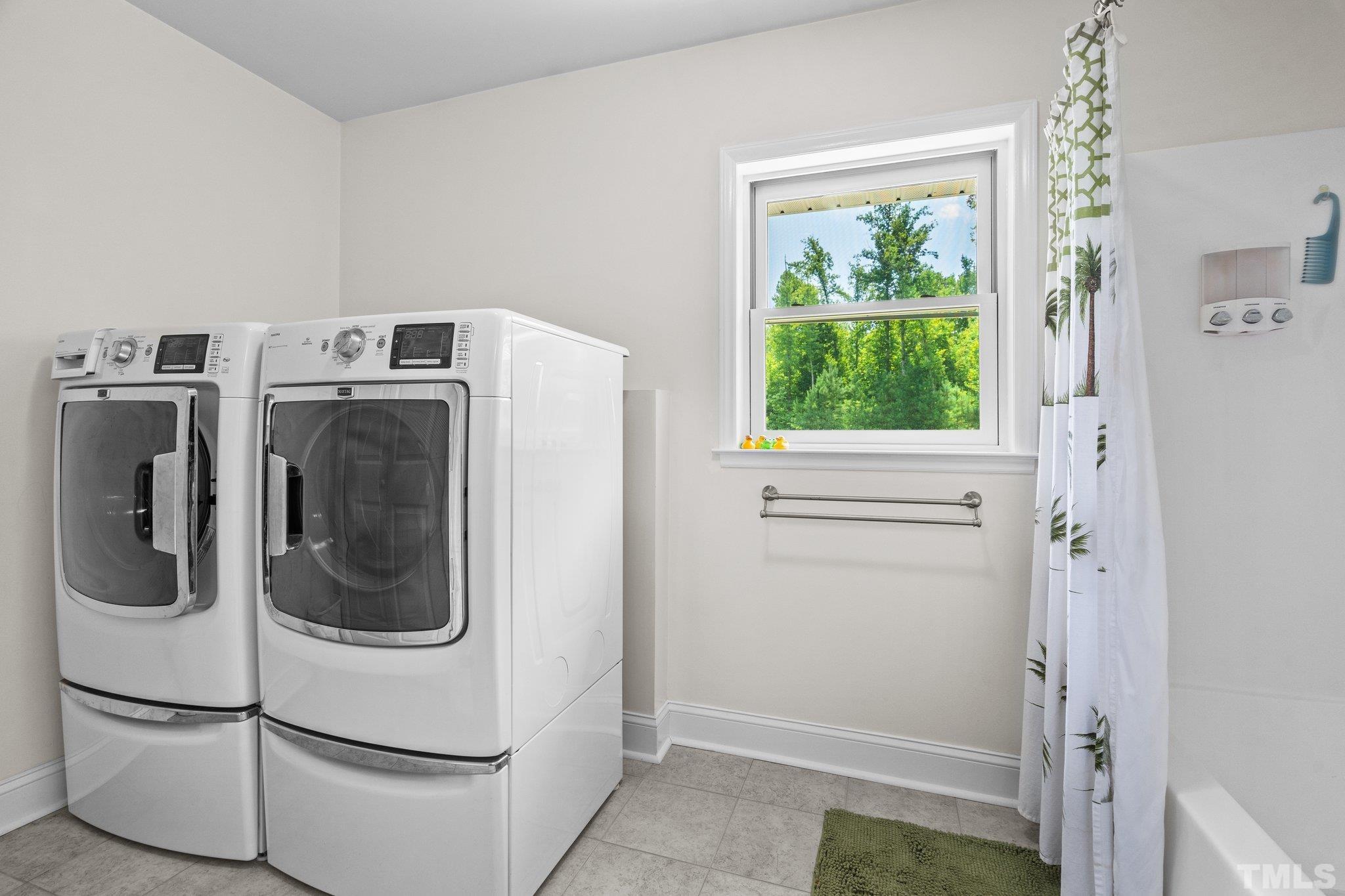 5012 Payton Drive Rougemont, NC 27572 - Photo 26 of 47 a utility room with dryer and washer