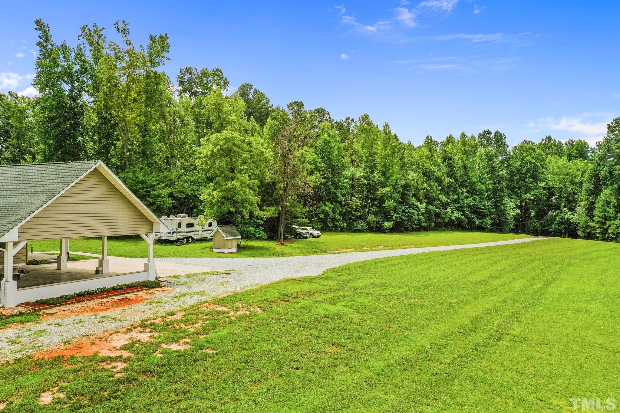 5012 Payton Drive Rougemont, NC 27572 - Photo 34 of 47 a view of a garden with a slide