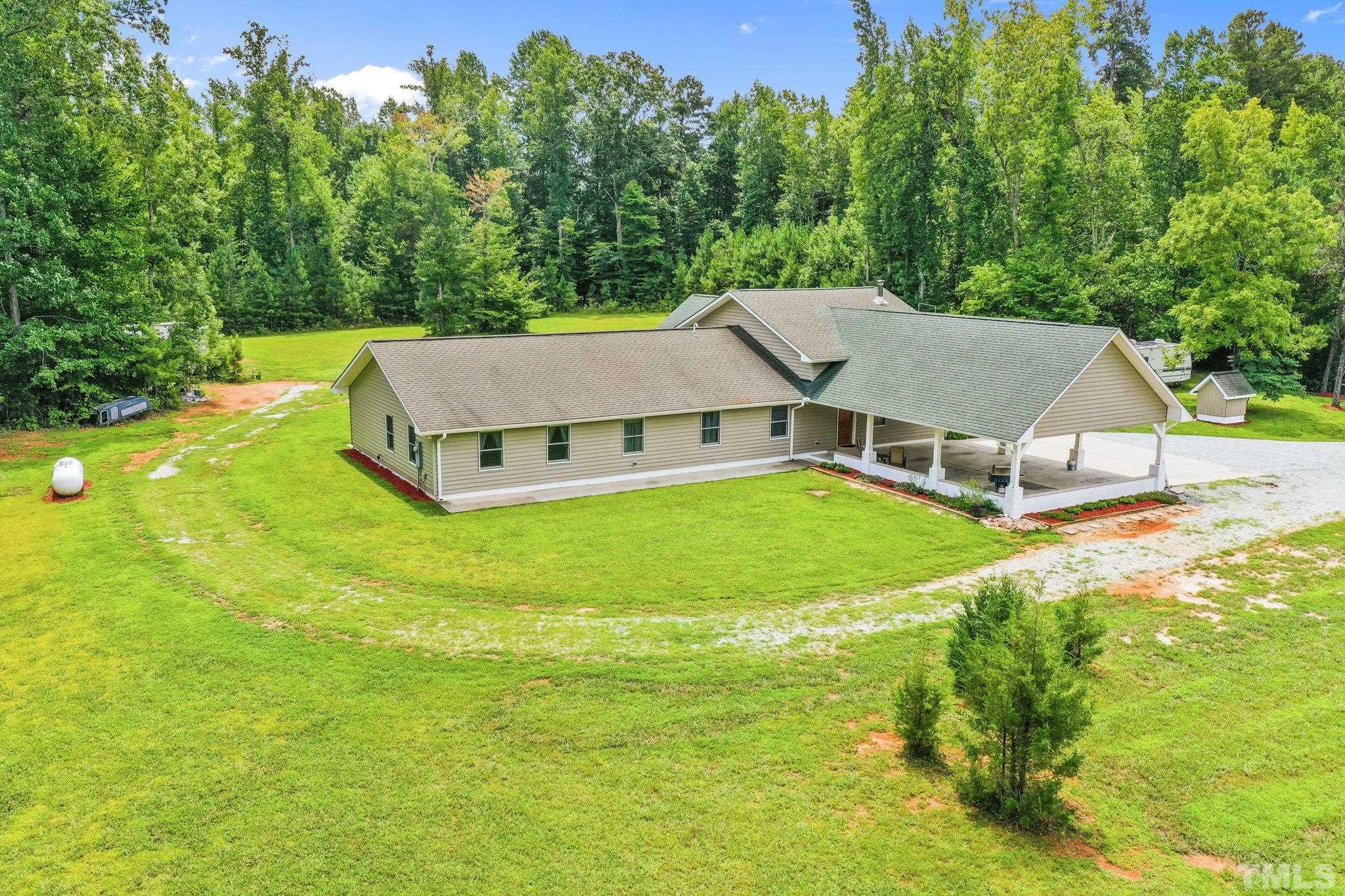 5012 Payton Drive Rougemont, NC 27572 - Photo 35 of 47 an aerial view of a house with swimming pool and deck