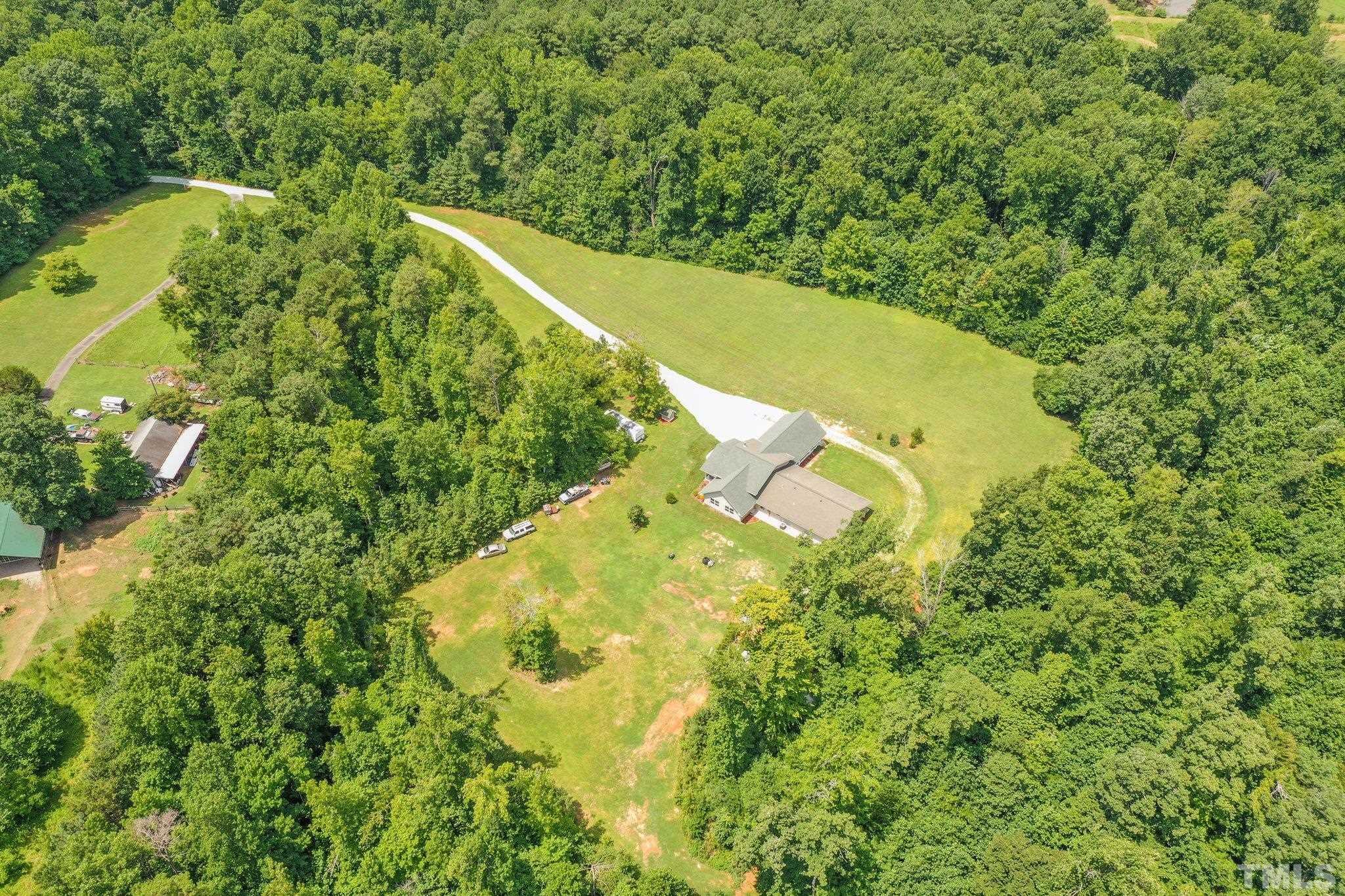 5012 Payton Drive Rougemont, NC 27572 - Photo 38 of 47 a view of a garden