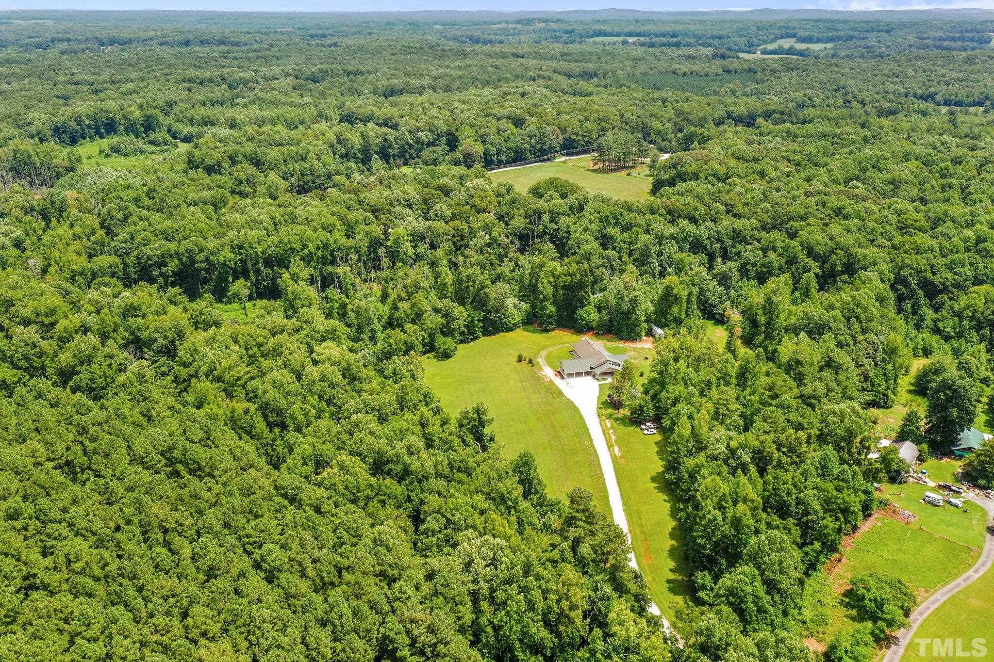 5012 Payton Drive Rougemont, NC 27572 - Photo 40 of 47 a view of a field with an ocean view