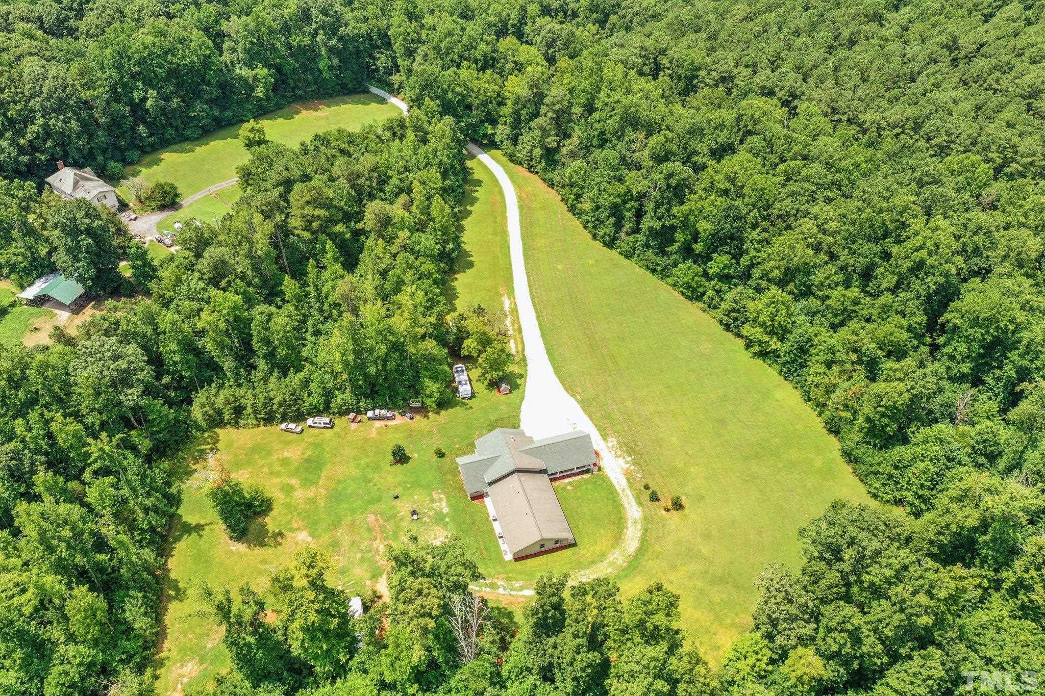 5012 Payton Drive Rougemont, NC 27572 - Photo 43 of 47 a view of a swimming pool with a yard