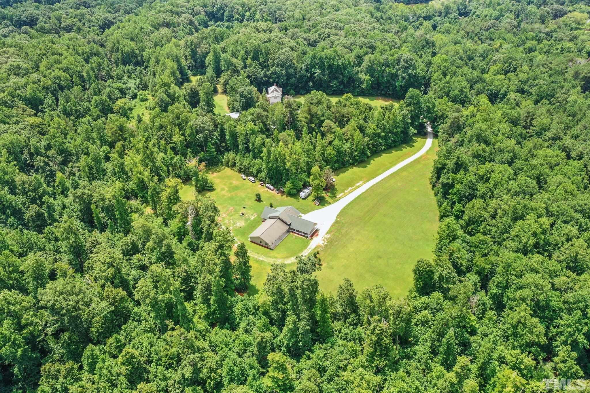 5012 Payton Drive Rougemont, NC 27572 - Photo 45 of 47 a view of a house in a garden