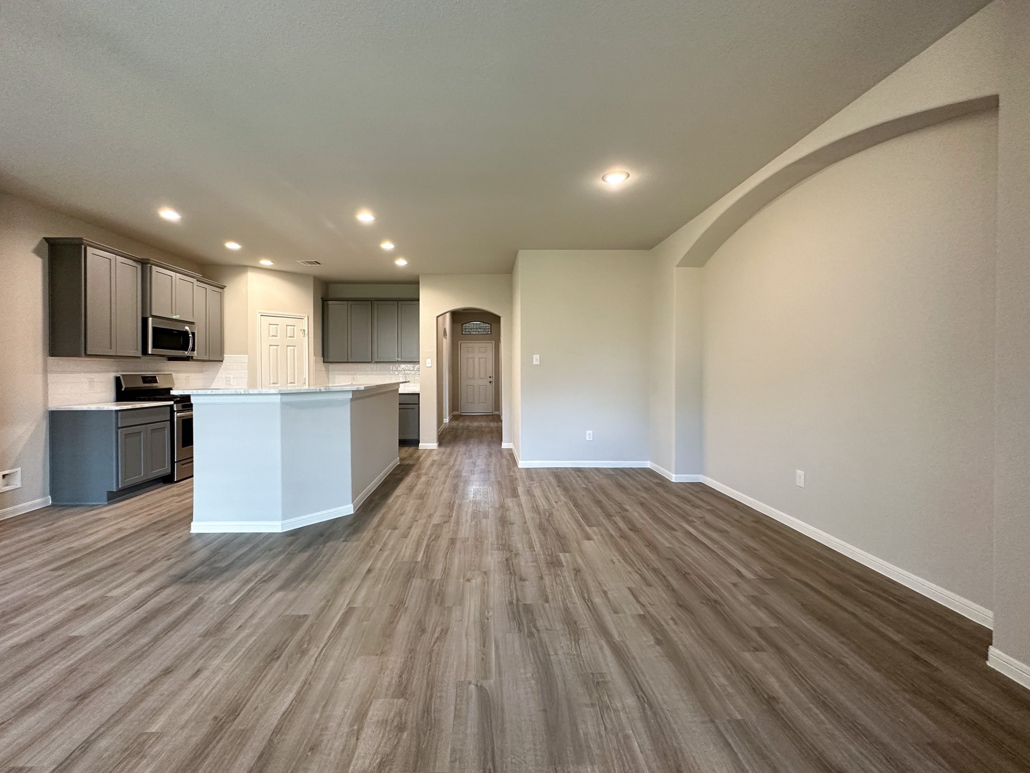 27079 Badger Way Magnolia, TX 77354 - Photo 25 of 40 a view of kitchen with wooden floor and electronic appliances