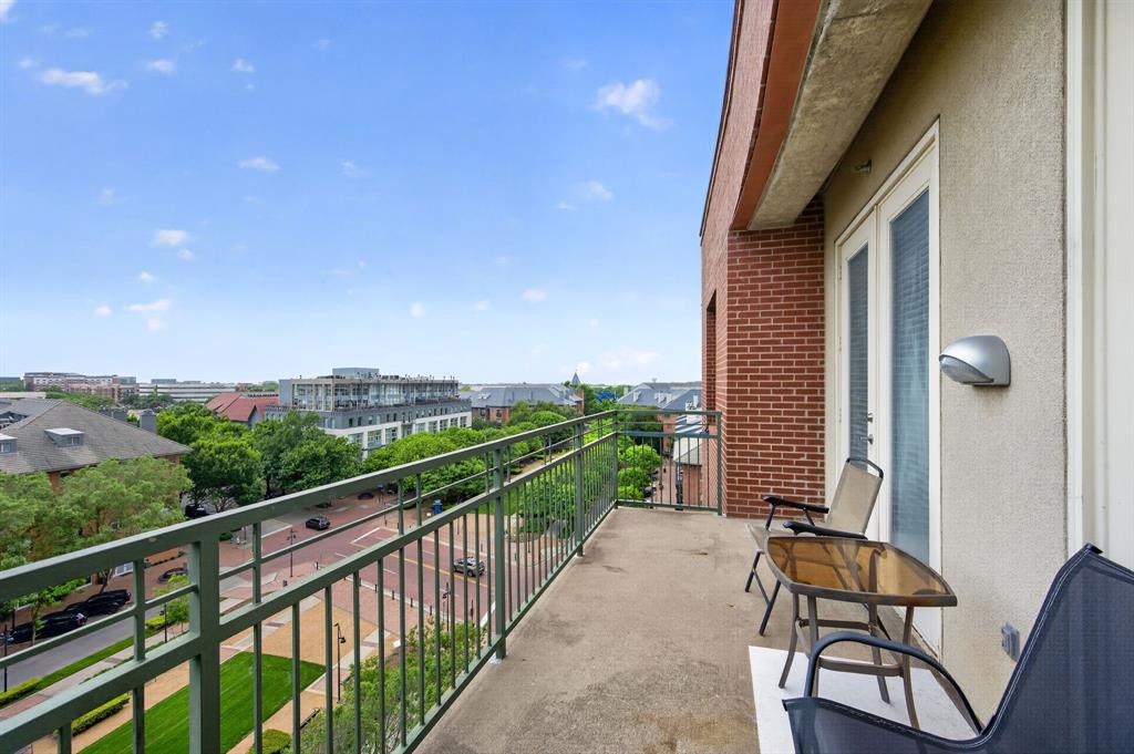 5055 Addison Circle, Unit 713 Addison, TX 75001 - Photo 29 of 40 Private balcony featuring concrete flooring and a metal railing