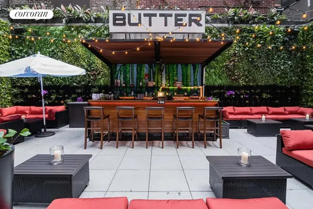 a building outdoor space with patio furniture