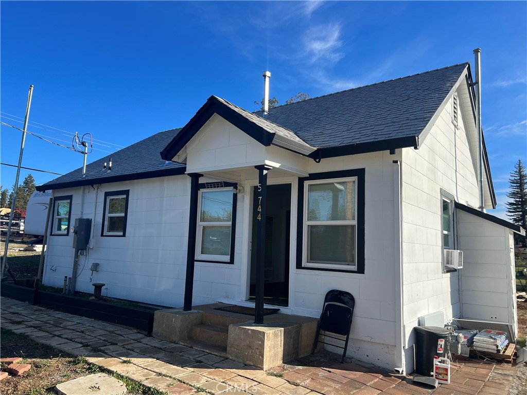 5744 Copeland Road Paradise, CA 95969 - Photo 1 of 1 a front view of a house with a yard