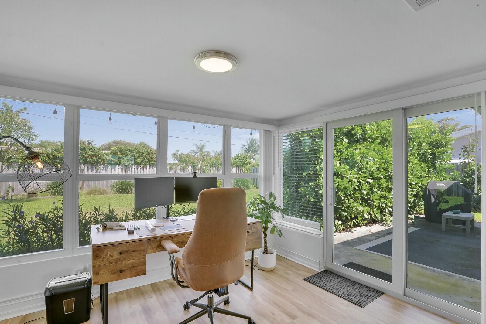 455 Northeast 34th Street Boca Raton, FL 33431 - Photo 11 of 27 Den with access to backyard