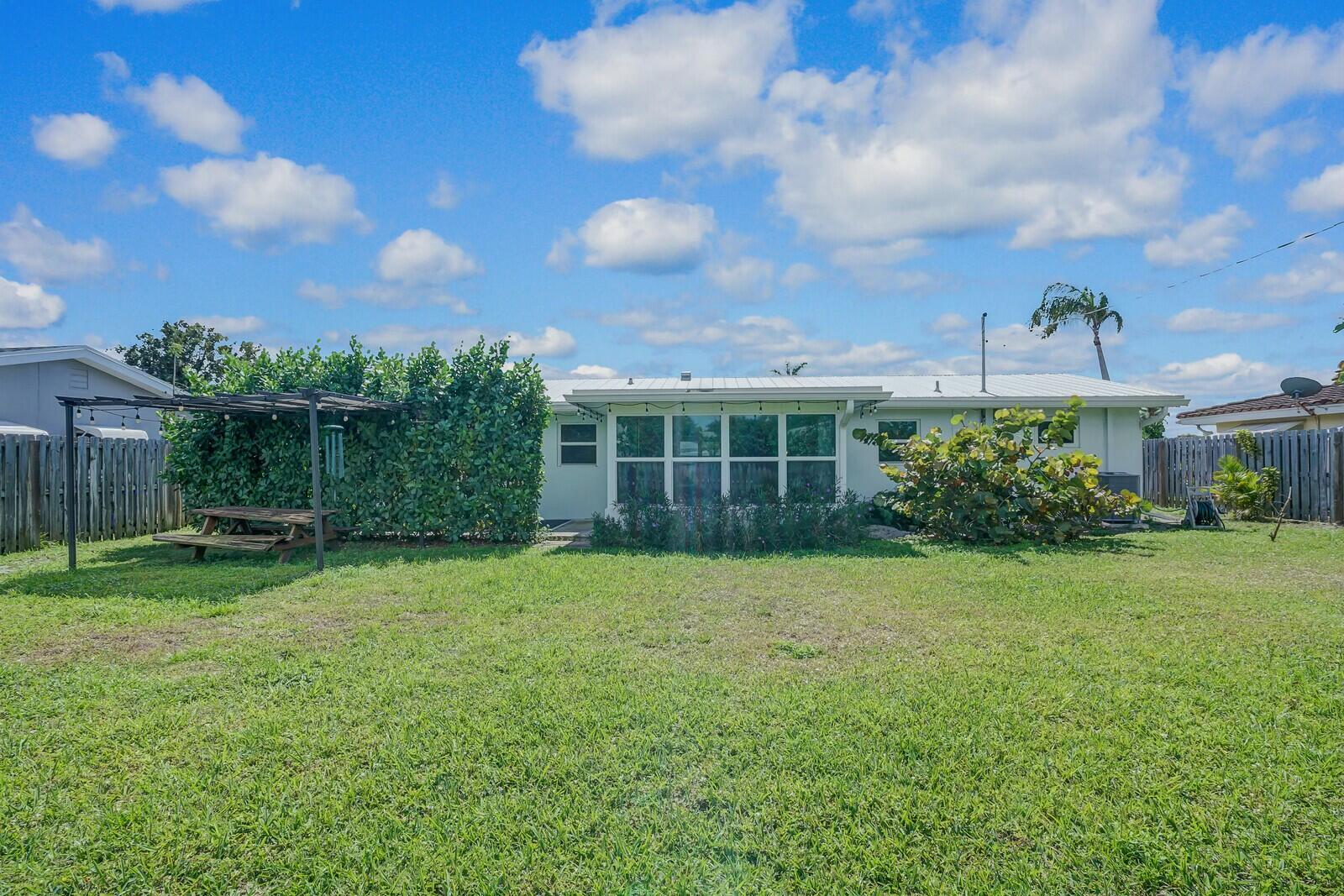 455 Northeast 34th Street Boca Raton, FL 33431 - Photo 24 of 27 Expansive Backyard Oasis