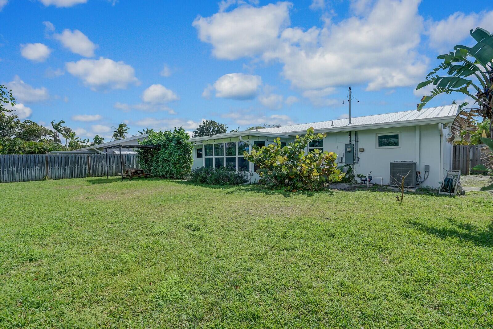 455 Northeast 34th Street Boca Raton, FL 33431 - Photo 26 of 27 Spacious Fenced Backyard