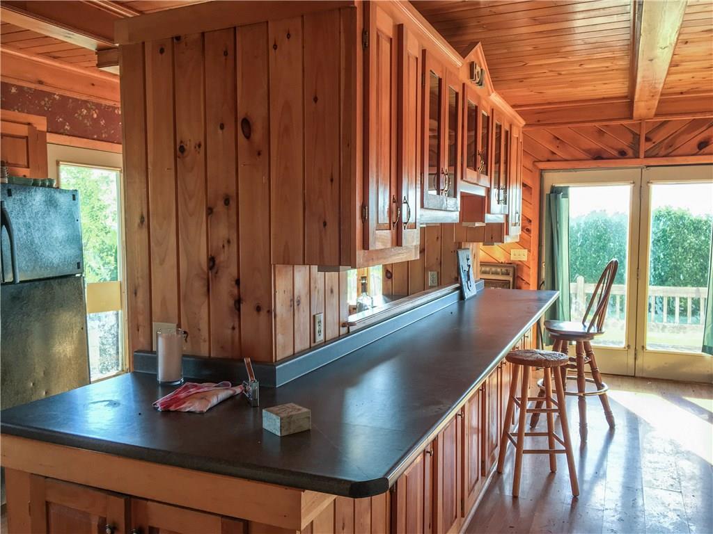 552 Enfield Road Lincoln, ME 04457 - Photo 8 of 35 Expansive breakfast bar/eat in...