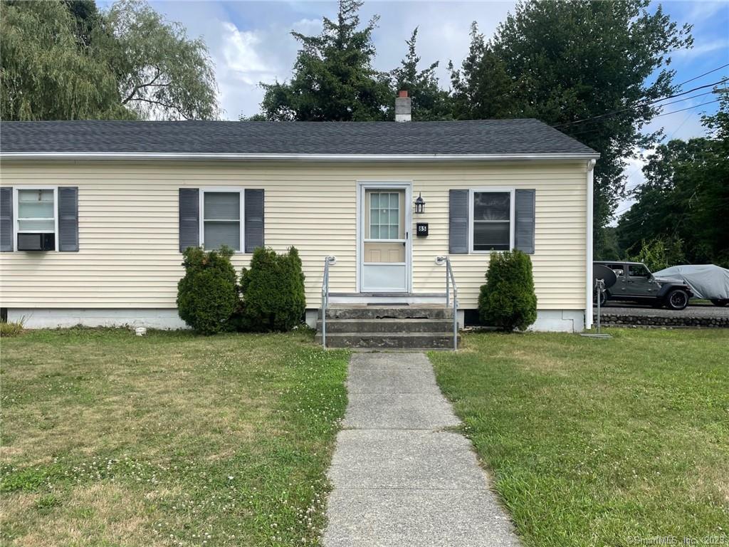 a view of a house with a garden