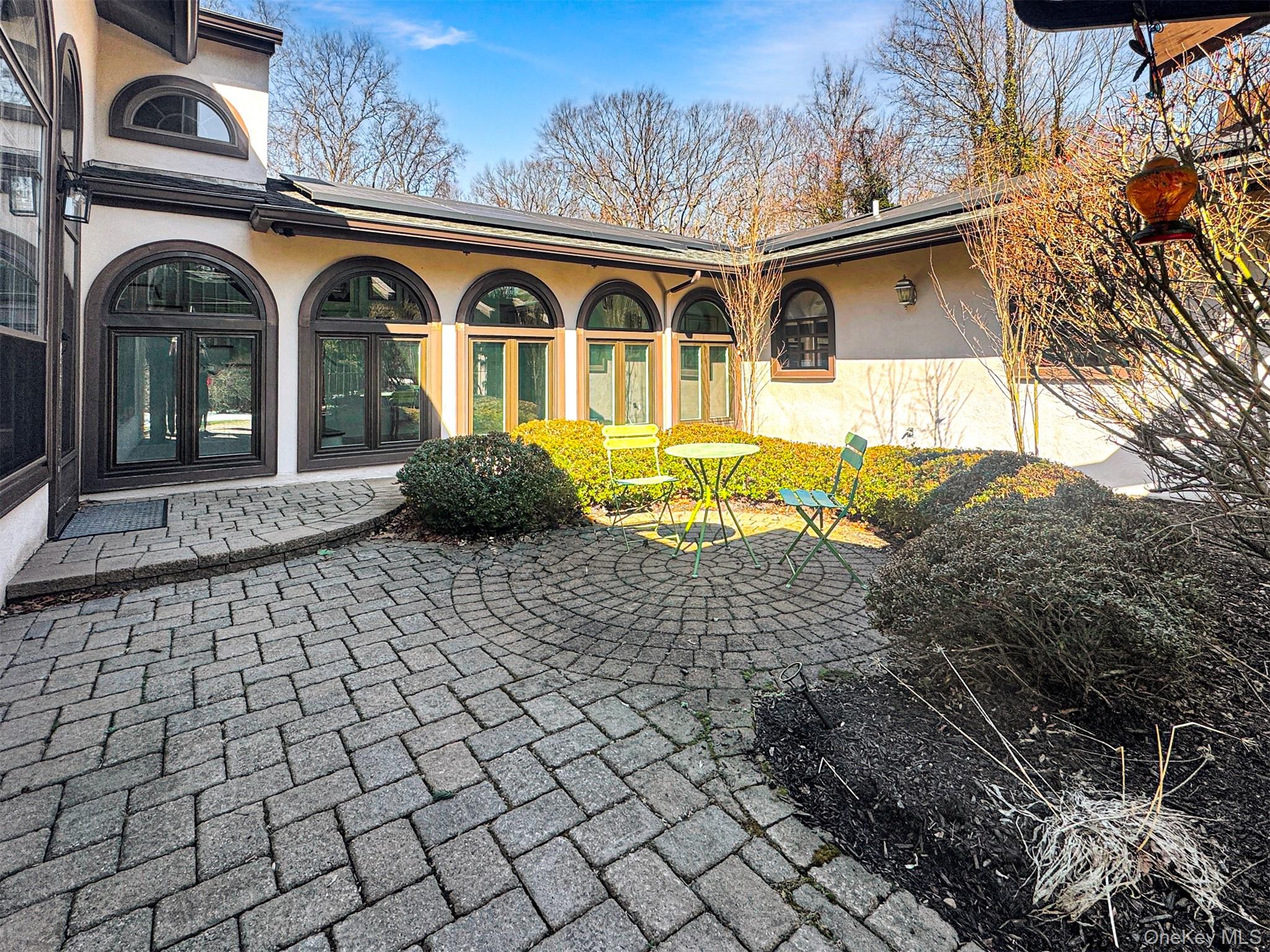 37 Bridle Path St. James, NY 11780 - Photo 38 of 38 a front view of a house with garden