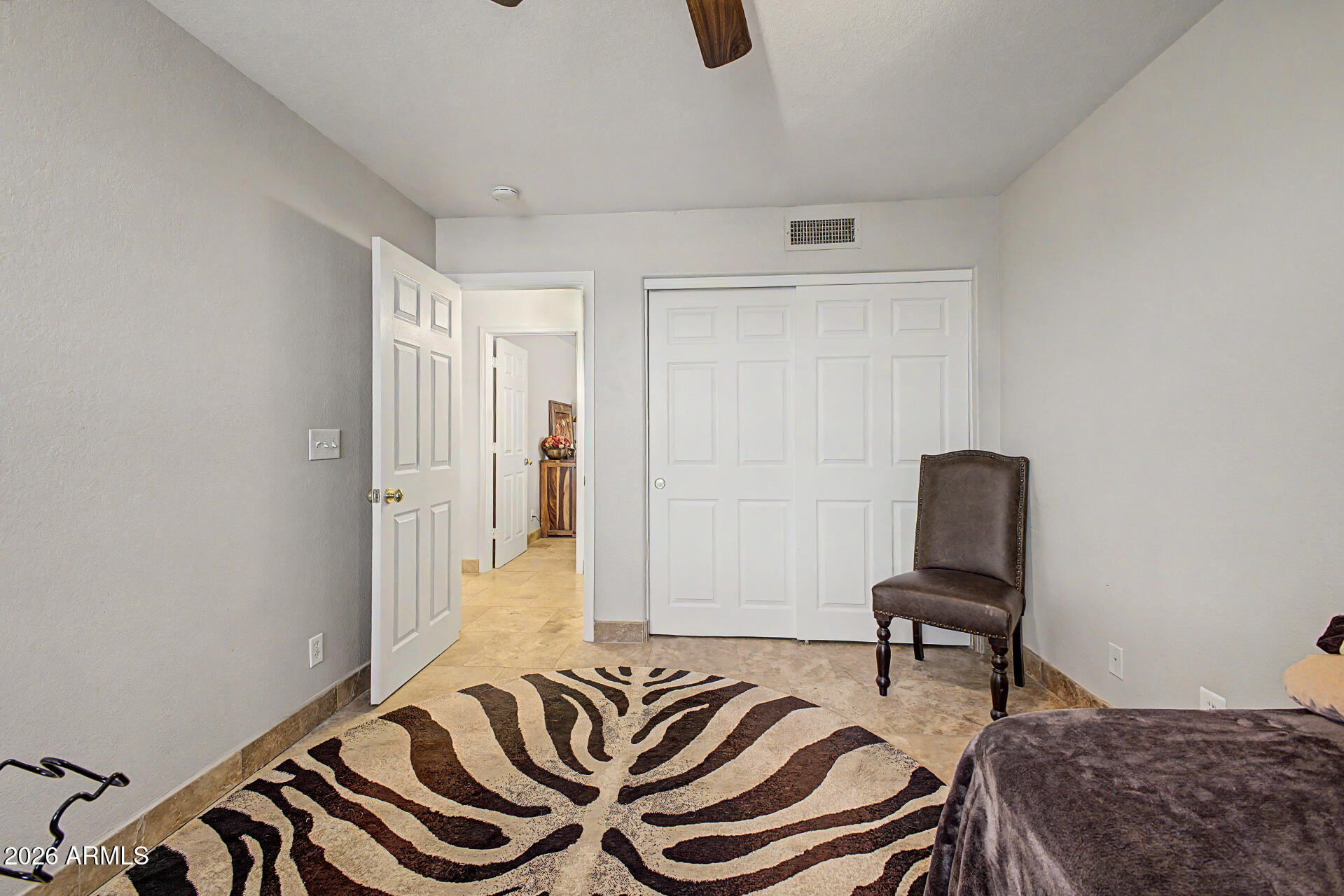 3948 North Ranier Mesa, AZ 85215 - Photo 31 of 69 a bedroom with a bed and a chair