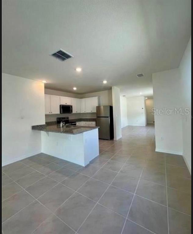 2432 Ribbon Fall Avenue Davenport, FL 33837 - Photo 12 of 17