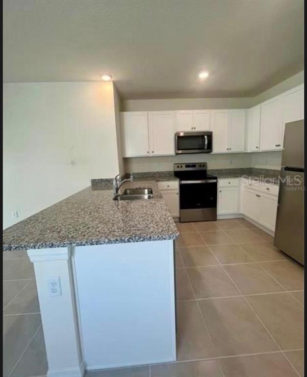 2432 Ribbon Fall Avenue Davenport, FL 33837 - Photo 9 of 17