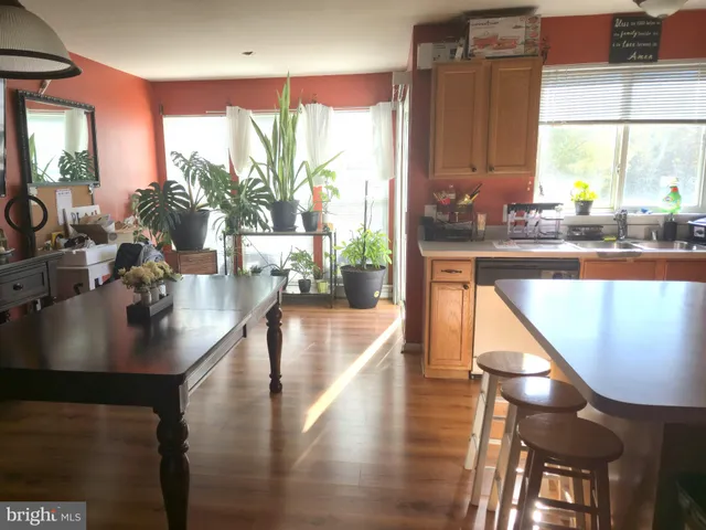a view of a living room and dining room