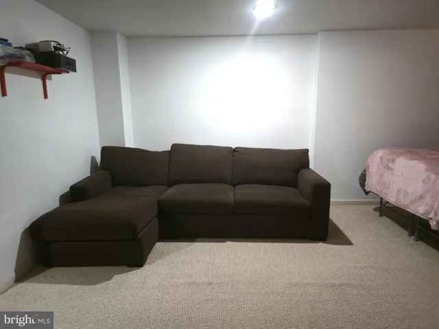 a living room with furniture and a couch