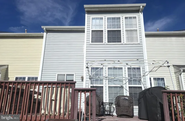 a front view of a house with a glass door