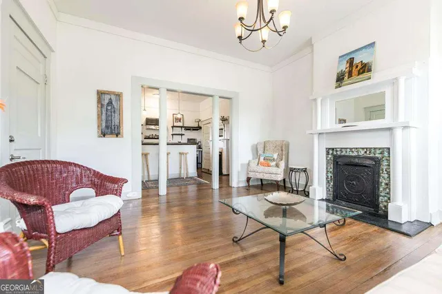 a living room with furniture or couch and a fireplace