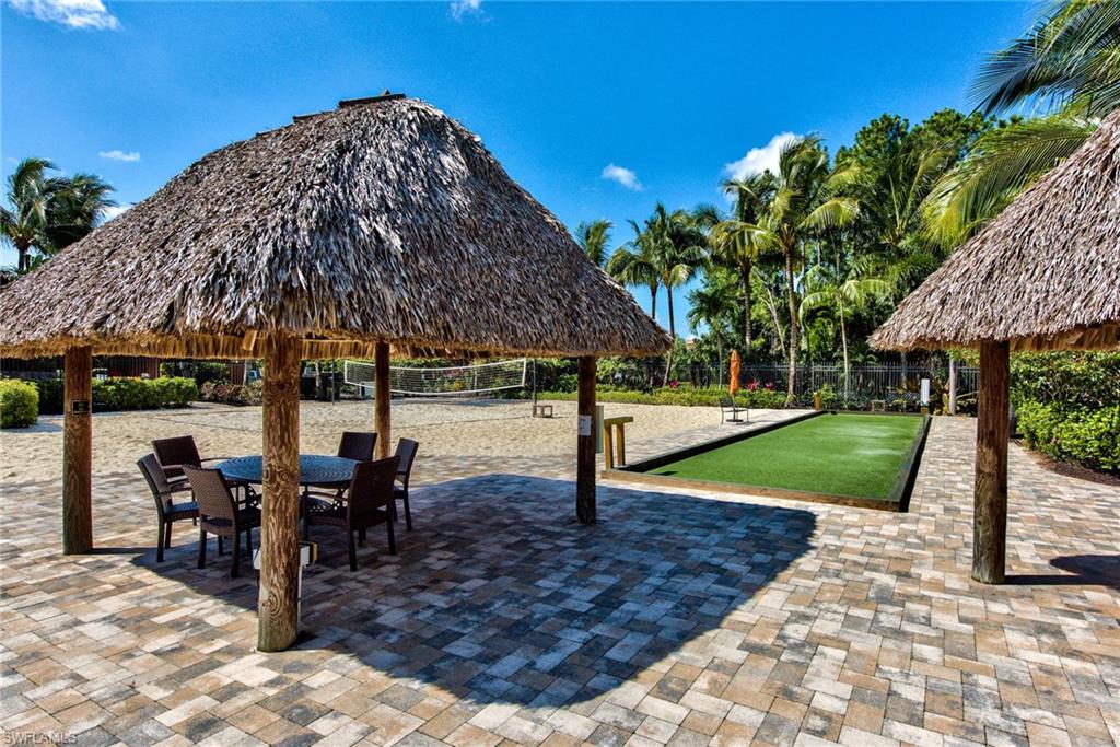9102 Capistrano Street South, Unit 7209 Naples, FL 34113 - Photo 17 of 25 a view of outdoor space yard and patio