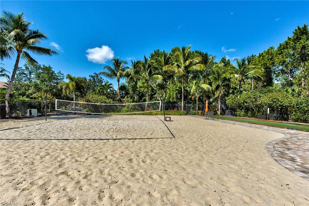 9102 Capistrano Street South, Unit 7209 Naples, FL 34113 - Photo 18 of 25 a view of a backyard