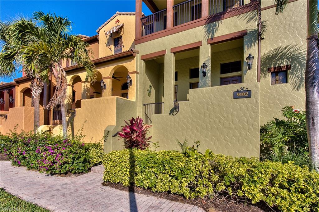 9102 Capistrano Street South, Unit 7209 Naples, FL 34113 - Photo 2 of 25 front view of a house