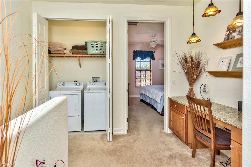 9102 Capistrano Street South, Unit 7209 Naples, FL 34113 - Photo 10 of 25 a view of a bedroom from a dining room