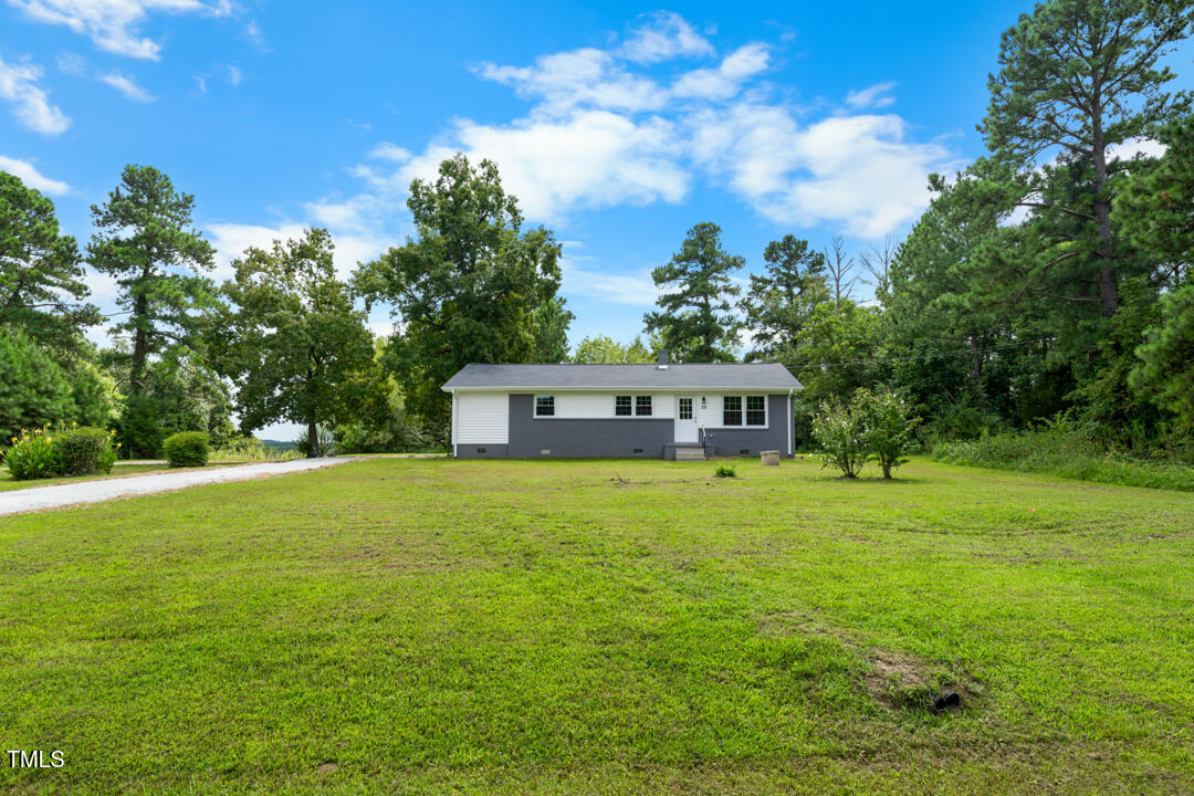 332 Gunn Poole Road Mebane, NC 27302 - Photo 23 of 27 a front view of a house with a garden