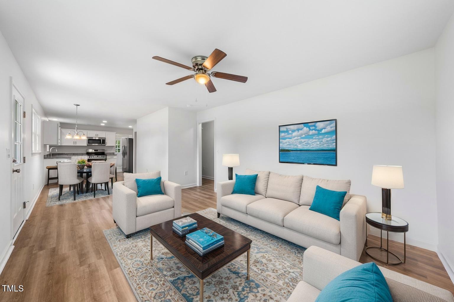 332 Gunn Poole Road Mebane, NC 27302 - Photo 7 of 27 a living room with furniture and a wooden floor