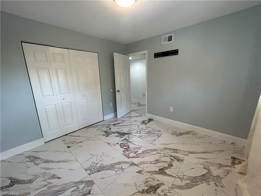 2346 Naples Trace Circle, Unit 1107 Naples, FL 34109 - Photo 11 of 17 Guest bedroom #1