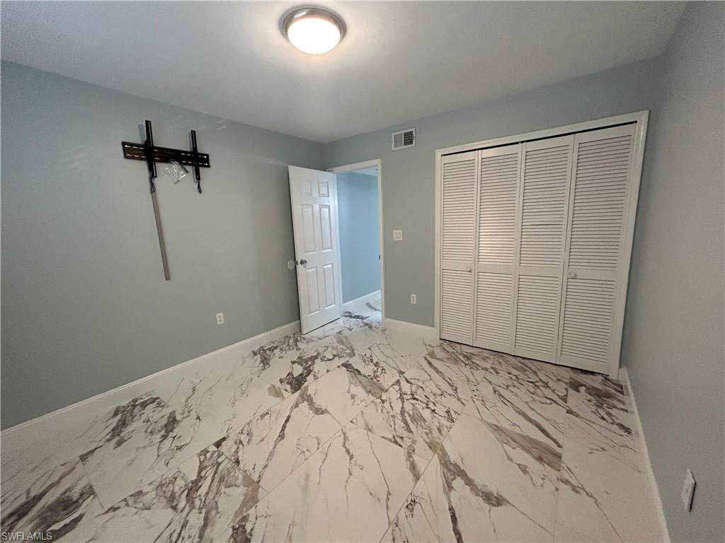 2346 Naples Trace Circle, Unit 1107 Naples, FL 34109 - Photo 12 of 17 Guest bedroom #2