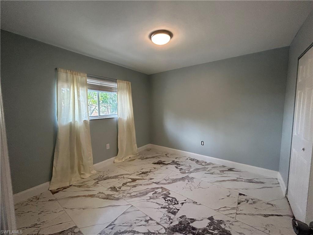 2346 Naples Trace Circle, Unit 1107 Naples, FL 34109 - Photo 10 of 17 Guest bedroom #1