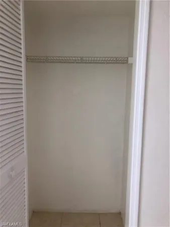 a view of a room with racks on the wall