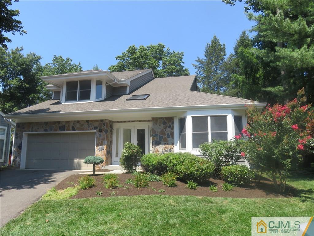 55 Primrose Circle Princeton, NJ 08540 - Photo 1 of 24 a view of a house with sitting area and garden
