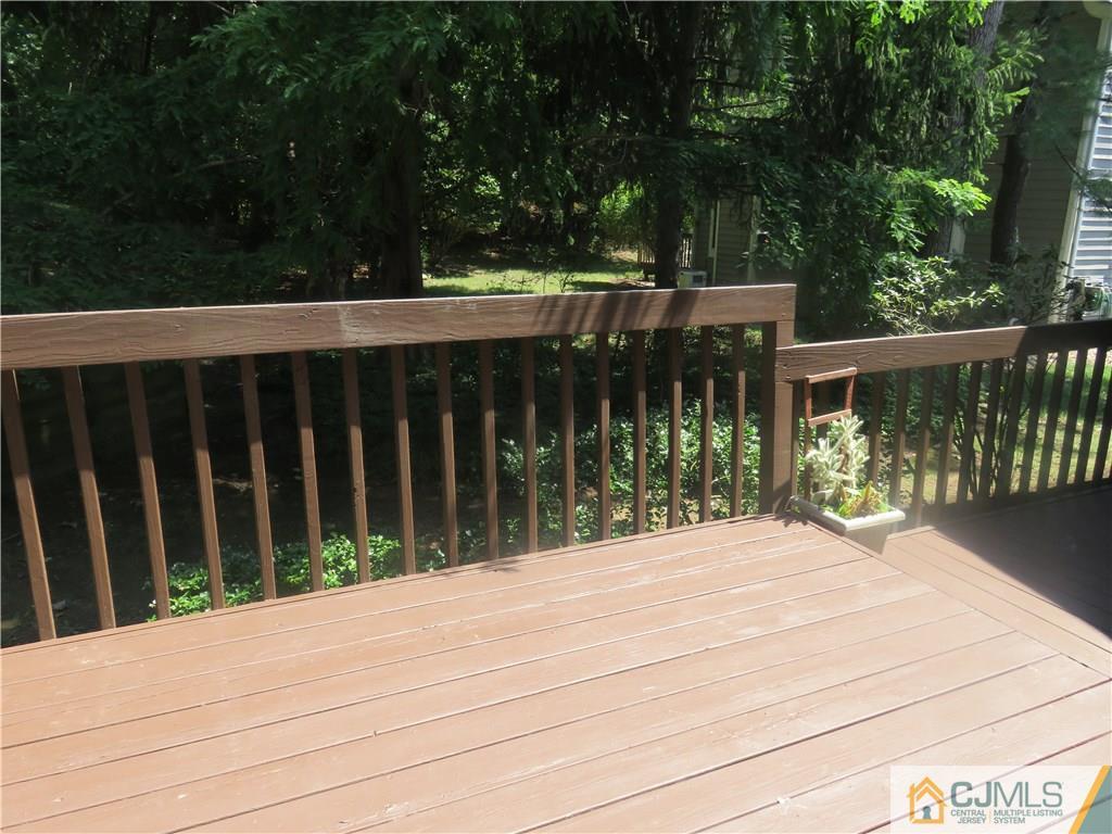 55 Primrose Circle Princeton, NJ 08540 - Photo 19 of 24 a view of balcony with wooden floor