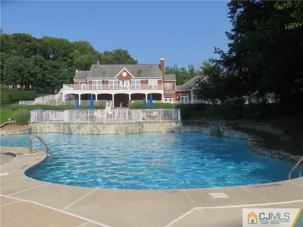 55 Primrose Circle Princeton, NJ 08540 - Photo 20 of 24 a view of a large building with a yard