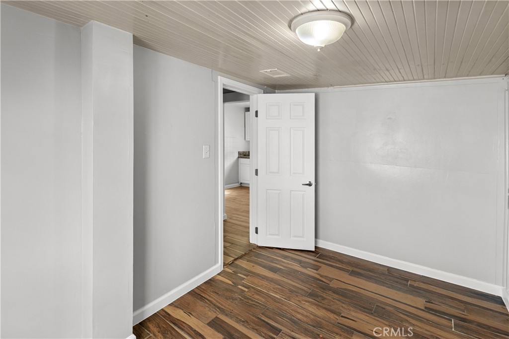 2521 P Bakersfield, CA 93301 - Photo 14 of 21 a view of an empty room with wooden floor