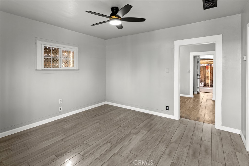 2521 P Bakersfield, CA 93301 - Photo 6 of 21 a view of empty room with wooden floor