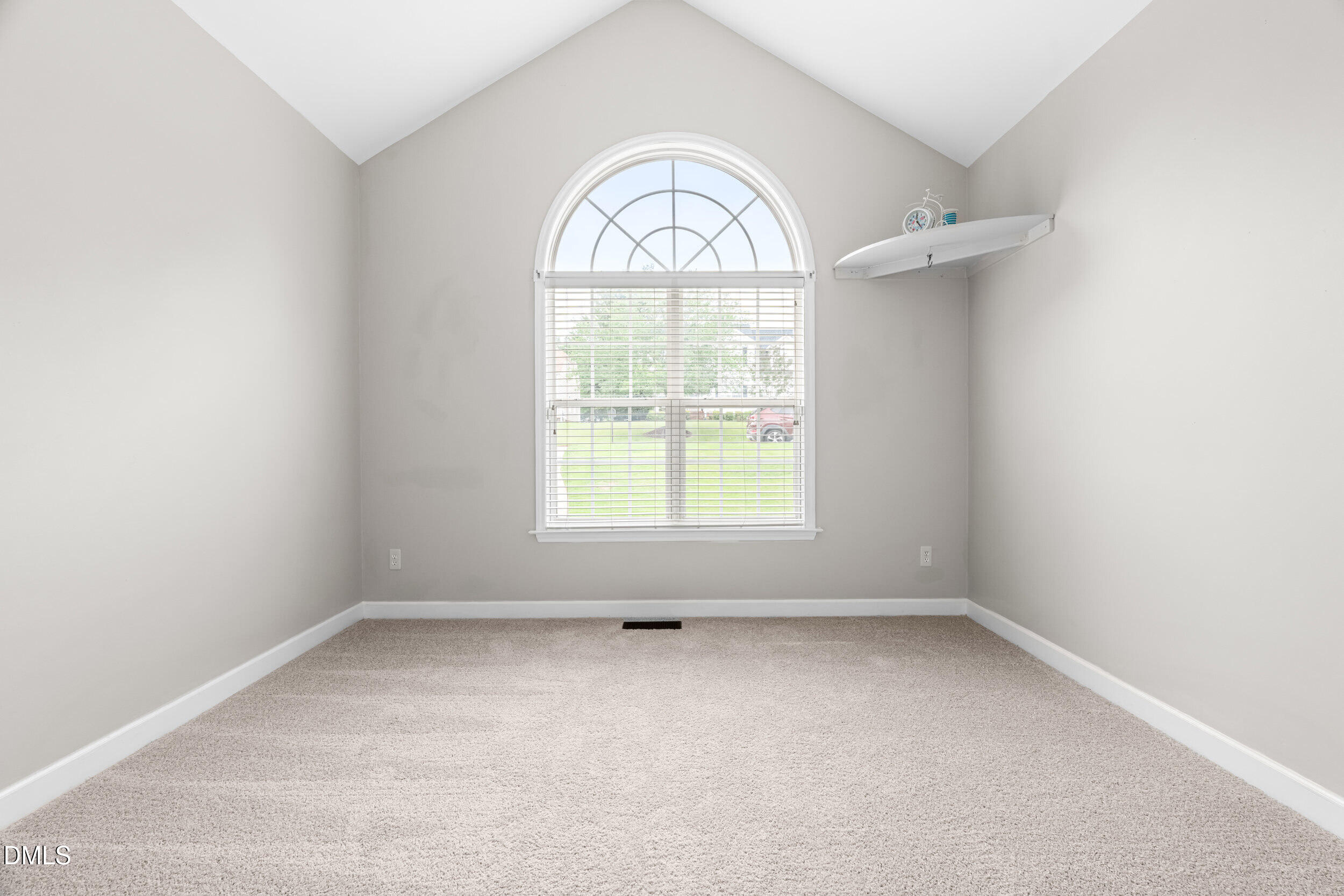 744 Seastone Street Raleigh, NC 27603 - Photo 33 of 53 an empty room with a window