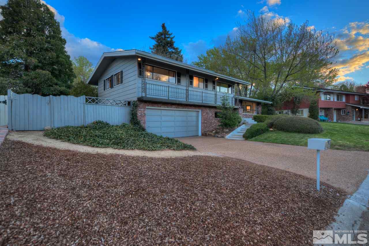 2085 Regent Street Reno, NV 89509 - Photo 3 of 25 a front view of a house with a yard