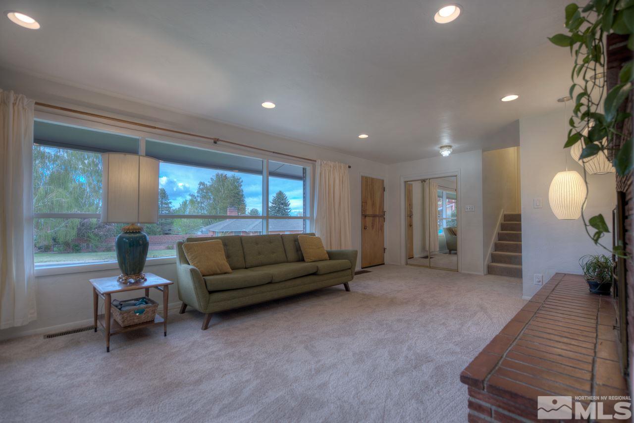 2085 Regent Street Reno, NV 89509 - Photo 5 of 25 a living room with furniture and a large window