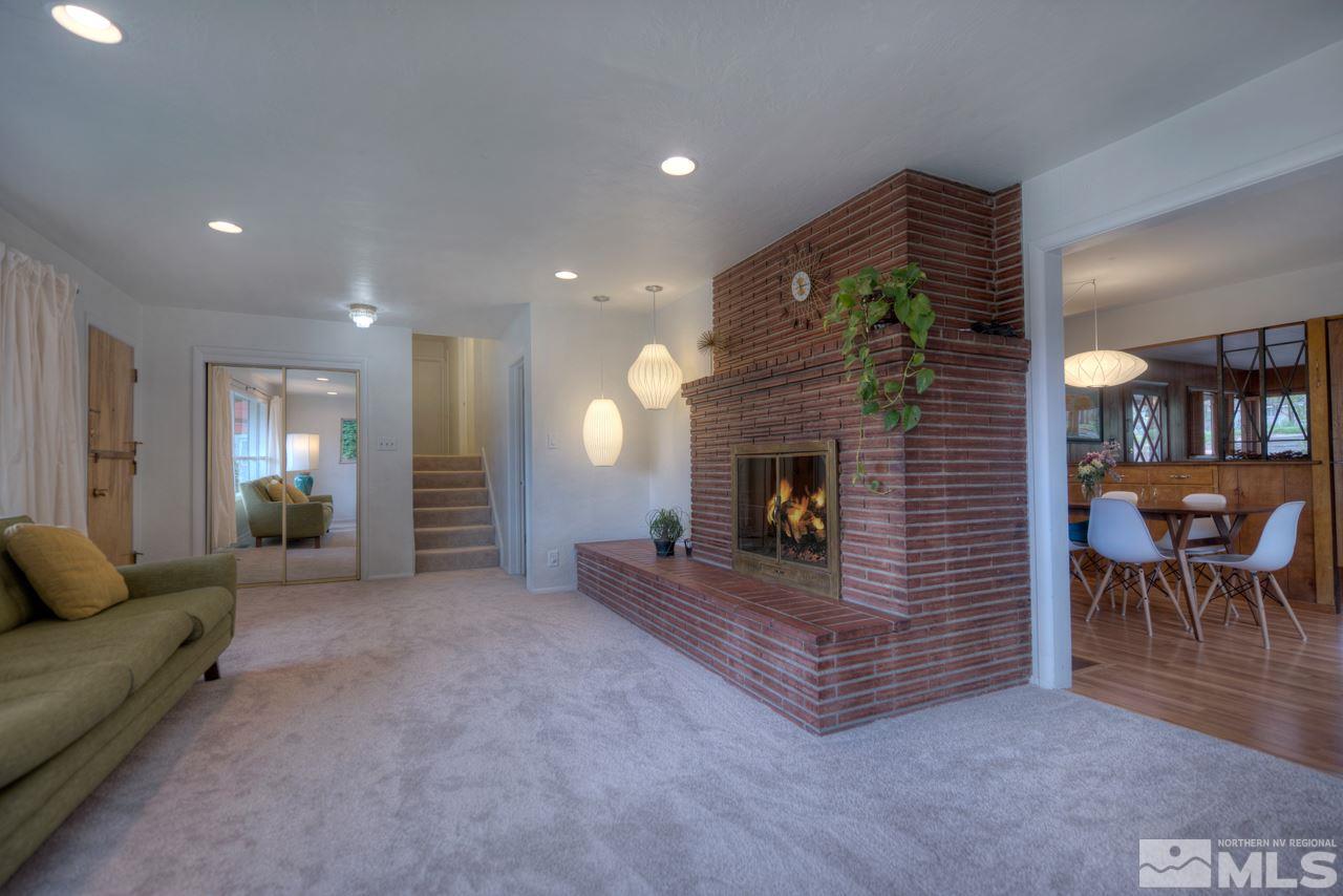 2085 Regent Street Reno, NV 89509 - Photo 6 of 25 a living room with furniture and a fireplace