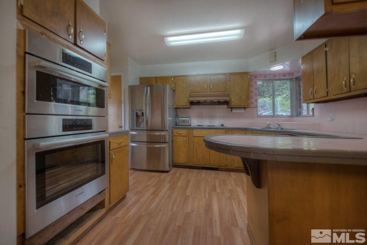 2085 Regent Street Reno, NV 89509 - Photo 8 of 25 a kitchen with counter space cabinets and appliances